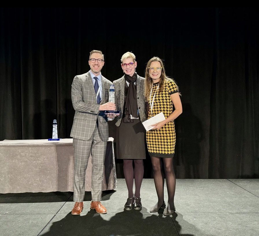 Nightingale College receiving NWCCU Beacon Award